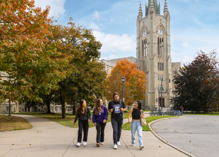 four students walking outside of Middlesex College.