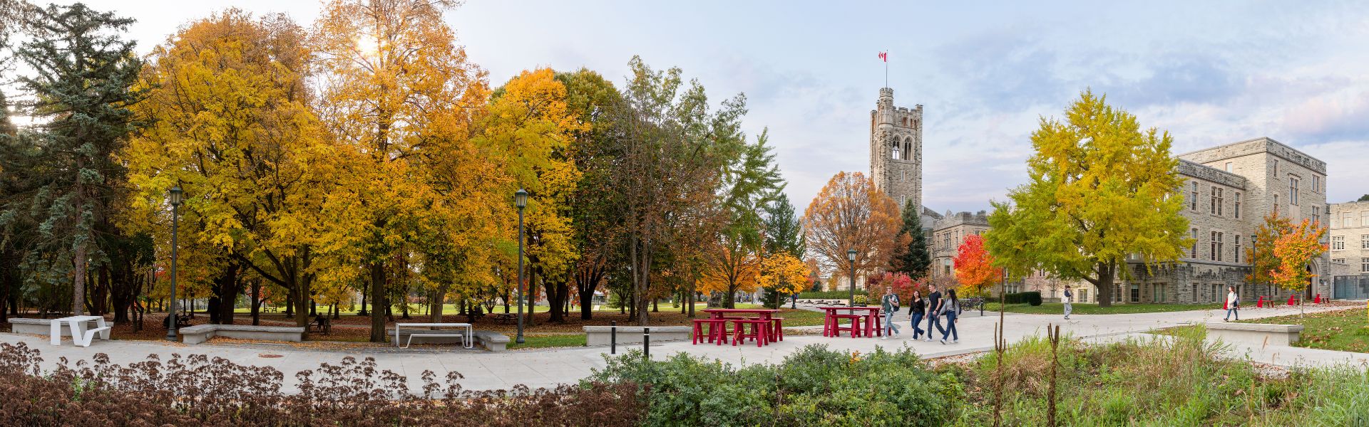 A wide angle picture of students walking in front of University College.